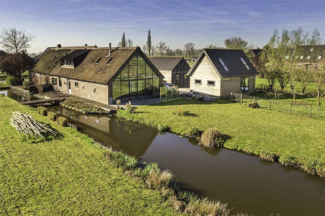 Unieke woning uitgelicht: Moderne woonboerderij met oneindig uitzicht